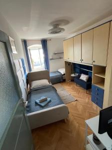 Ένα ή περισσότερα κρεβάτια σε δωμάτιο στο Spalato