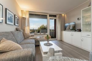 Posezení v ubytování Berolina Nest am Meer 409
