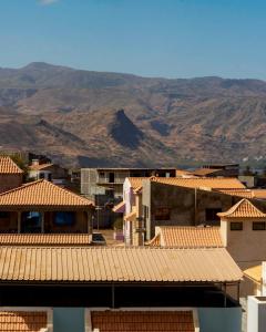 a view of a city with mountains in the background at Kasa Sirena in Tarrafal