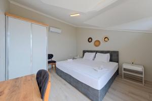 Postel nebo postele na pokoji v ubytování Villa Aromatherapy