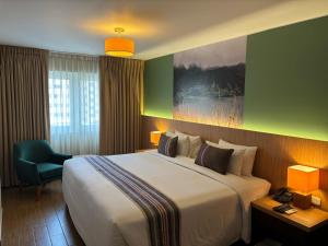 Postel nebo postele na pokoji v ubytování Hotel El Tambo 2