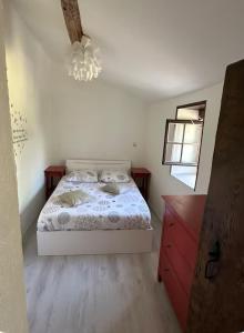 Postel nebo postele na pokoji v ubytování Gîte des Bourboul + 5 fotografií