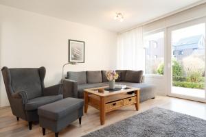 Posezení v ubytování Strandhotel Kellenhusen Wohnung 3