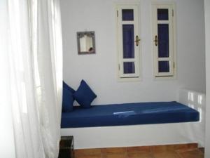 A bed or beds in a room at Niriedes Villas