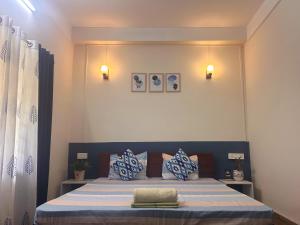 Postel nebo postele na pokoji v ubytování Mulaqat Homestay