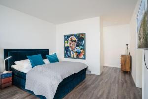 Postel nebo postele na pokoji v ubytování Appartementhaus Terrassenhügel Strandsuite