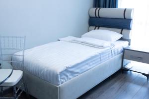 Letto o letti in una camera di Fidji Hotel