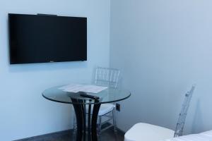 TV o dispositivi per l'intrattenimento presso Fidji Hotel