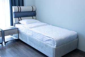 Letto o letti in una camera di Fidji Hotel