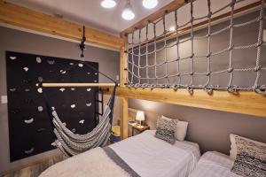 Una cama o camas en una habitación de 2023年新築 個室サウナ 浅間山絶景 軽井沢アウトレット圏内 VillaHanasaku 軽井沢御代田 Hoshi棟