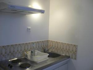 Η κουζίνα ή μικρή κουζίνα στο Bel appartement meublé et aménagé +53 φωτογραφίες