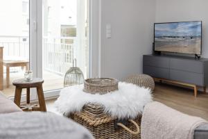 TV a/nebo společenská místnost v ubytování Wohnung 6- Liebefeld