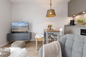 Posezení v ubytování Wohnung 6- Liebefeld + 18 fotografií