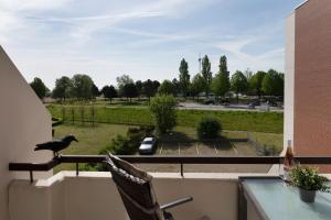 Balkón nebo terasa v ubytování Villa am Meer Pier 52