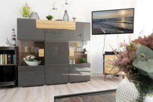 Kuchyň nebo kuchyňský kout v ubytování Villa am Meer Pier 52