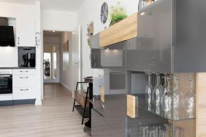 Kuchyň nebo kuchyňský kout v ubytování Villa am Meer Pier 52