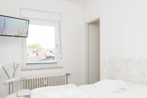 Postel nebo postele na pokoji v ubytování Villa am Meer Pier 52