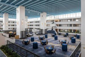 a view of therium of a building with tables and chairs at The Inn at Opryland, A Gaylord Hotel in Nashville