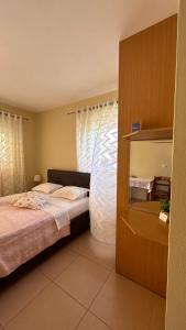 Posteľ alebo postele v izbe v ubytovaní Dimitra Rooms