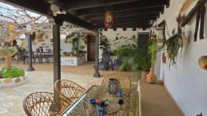 Reštaurácia alebo iné gastronomické zariadenie v ubytovaní Casa Abuelo Rafael