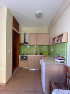 Kuchyňa alebo kuchynka v ubytovaní Dimitra Rooms
