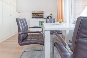 Kuchyň nebo kuchyňský kout v ubytování Haus Eva Mar am Meer Appartement 4