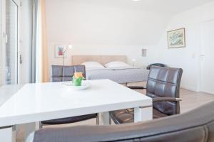 Postel nebo postele na pokoji v ubytování Haus Eva Mar am Meer Appartement 4