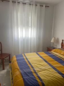 Posteľ alebo postele v izbe v ubytovaní Casa en el centro de Conil