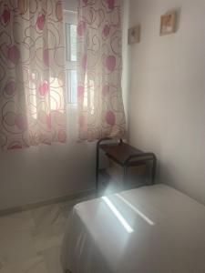 Posteľ alebo postele v izbe v ubytovaní Casa en el centro de Conil
