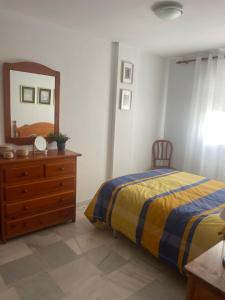Posteľ alebo postele v izbe v ubytovaní Casa en el centro de Conil