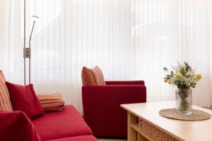 Posezení v ubytování Sonnenwinkel Wohnung 2