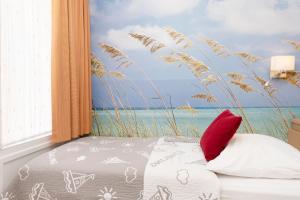 Postel nebo postele na pokoji v ubytování Sonnenwinkel Wohnung 2