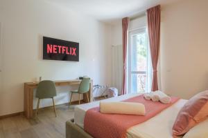 Letto o letti in una camera di Sant'Orsola Lodge Bologna