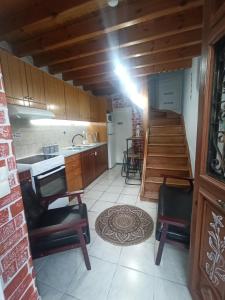 Η κουζίνα ή μικρή κουζίνα στο Little Angelo's Cottage - Greek Autumn Charm