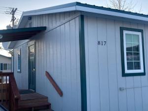 a house with the number on the side of it at Riverside Hotel in Nenana