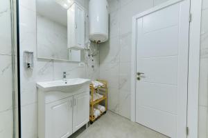 Koupelna v ubytování ARA Lux Apartments