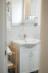 Koupelna v ubytování ARA Lux Apartments