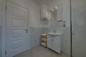 Koupelna v ubytování ARA Lux Apartments