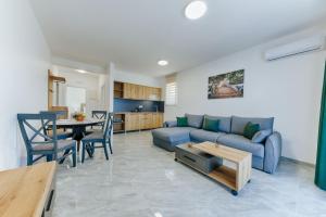 Kuchyň nebo kuchyňský kout v ubytování ARA Lux Apartments
