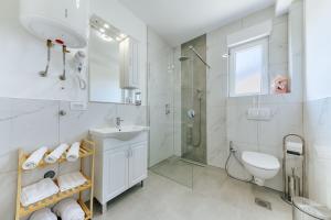 Koupelna v ubytování ARA Lux Apartments