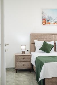 Postel nebo postele na pokoji v ubytování ARA Lux Apartments