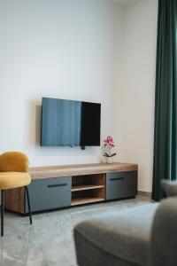 TV a/nebo společenská místnost v ubytování ARA Lux Apartments
