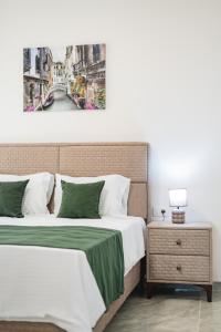 Postel nebo postele na pokoji v ubytování ARA Lux Apartments
