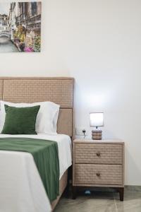 Postel nebo postele na pokoji v ubytování ARA Lux Apartments