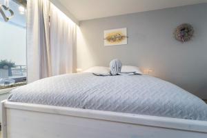 Giường trong phòng chung tại Berolina Jule +41 ảnh