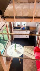 Kuchyň nebo kuchyňský kout v ubytování frente al mar tiny house