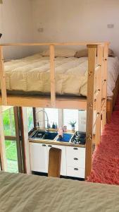 Kuchyň nebo kuchyňský kout v ubytování frente al mar tiny house