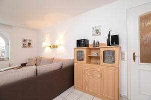 TV a/nebo společenská místnost v ubytování Haus Pegasus Gartenliebe