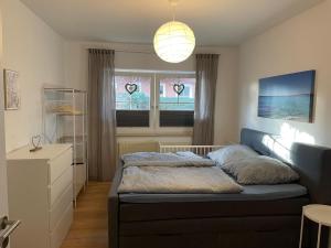 Katil atau katil-katil dalam bilik di Wulfener Family Appartment