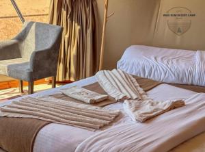 Postel nebo postele na pokoji v ubytování WADl RUM DESERT CAMP